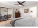 Bright bedroom with a queen-size bed and access to a private balcony at 4950 N Miller Rd # 347, Scottsdale, AZ 85251