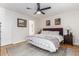 Spacious bedroom with king-size bed, ceiling fan, and ample natural light at 4950 N Miller Rd # 347, Scottsdale, AZ 85251