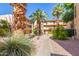 Landscaped courtyard with walking path and lush greenery at 4950 N Miller Rd # 347, Scottsdale, AZ 85251