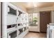 Modern laundry facilities with plenty of washers and dryers at 4950 N Miller Rd # 347, Scottsdale, AZ 85251