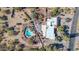 Aerial view of single-story home with pool and desert landscaping at 4979 E Calle De Los Arboles --, Cave Creek, AZ 85331