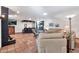 Living area with terracotta floors, a fireplace, and views of the backyard at 4979 E Calle De Los Arboles --, Cave Creek, AZ 85331