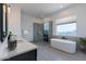 Modern bathroom with freestanding tub, glass shower, and dual vanities at 508 W Tanya Rd, Phoenix, AZ 85086