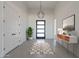 Elegant entryway with a modern chandelier and stylish console table at 508 W Tanya Rd, Phoenix, AZ 85086