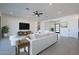 Bright and airy living room with a comfortable sofa and large TV at 508 W Tanya Rd, Phoenix, AZ 85086