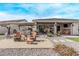 Outdoor kitchen, covered patio, and seating area at 5645 N Crow Dr, Eloy, AZ 85131