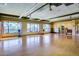 Bright fitness room with hardwood floors and large windows at 5645 N Crow Dr, Eloy, AZ 85131