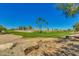 Scenic view of a lush green golf course at 5645 N Crow Dr, Eloy, AZ 85131