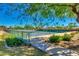 Well-maintained tennis courts with surrounding landscaping at 5645 N Crow Dr, Eloy, AZ 85131