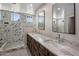 Modern bathroom with double vanity and large walk-in shower at 5660 N 73Rd St, Scottsdale, AZ 85250