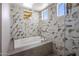 Relaxing bathroom with soaking tub and marble tile at 5660 N 73Rd St, Scottsdale, AZ 85250