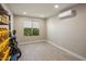 Bright and spacious bonus room with window and storage shelving at 5660 N 73Rd St, Scottsdale, AZ 85250