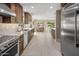 Modern kitchen featuring stainless steel appliances and ample counter space at 5660 N 73Rd St, Scottsdale, AZ 85250