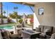 Relaxing patio with fire pit and comfortable seating area at 5660 N 73Rd St, Scottsdale, AZ 85250