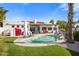 Inviting kidney shaped pool with grassy backyard at 5660 N 73Rd St, Scottsdale, AZ 85250