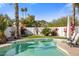 Inviting pool with expansive patio and lush landscaping at 5660 N 73Rd St, Scottsdale, AZ 85250