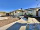 Home exterior with walkway and mosaic tile bench at 5708 W Belmont Ave, Glendale, AZ 85301