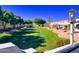 Expansive green lawn and landscaping in community at 5830 E Mckellips Rd # 101, Mesa, AZ 85215