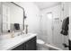 Stylish bathroom with walk-in shower and modern fixtures at 6602 E Lafayette Blvd, Scottsdale, AZ 85251