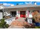 Brick steps leading to a red front door with outdoor seating at 6602 E Lafayette Blvd, Scottsdale, AZ 85251