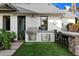 Outdoor kitchen with stainless steel appliances and a stone countertop at 6602 E Lafayette Blvd, Scottsdale, AZ 85251