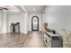 Bright and airy entryway with tile floors and decorative console table at 6616 S Bridal Vail Dr, Gilbert, AZ 85298