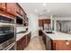 Modern kitchen with stainless steel appliances and an island at 6616 S Bridal Vail Dr, Gilbert, AZ 85298