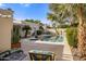 Relaxing backyard oasis with a sparkling pool and patio furniture at 7354 E San Miguel Ave, Scottsdale, AZ 85250