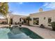 Inviting pool area with patio furniture and lush landscaping at 7354 E San Miguel Ave, Scottsdale, AZ 85250