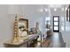 Sophisticated entryway with console table and stylish decor at 7483 S Loback Ct, Queen Creek, AZ 85142