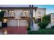 Stunning two-story home with red tile driveway and lush landscaping at 7500 E Mccormick Pkwy # 63, Scottsdale, AZ 85258