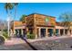 Exterior view of a Starbucks with drive-thru and outdoor seating at 7500 E Mccormick Pkwy # 63, Scottsdale, AZ 85258