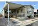 Exterior of manufactured home with carport at 7750 E Broadway Rd # 175, Mesa, AZ 85208