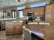 Large kitchen with island, stainless steel appliances, and ample cabinetry at 7750 E Broadway Rd # 175, Mesa, AZ 85208