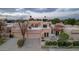 Aerial view of a two-story home with a Spanish-style roofline at 7756 E San Miguel Ave, Scottsdale, AZ 85250