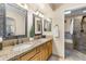 Elegant bathroom with double sinks, granite countertops, and a separate shower at 7756 E San Miguel Ave, Scottsdale, AZ 85250