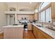 Modern kitchen with stainless steel appliances and island at 8429 W Salter Dr, Peoria, AZ 85382