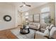 Bright living room with hardwood floors and neutral decor at 8429 W Salter Dr, Peoria, AZ 85382