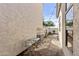 Small patio with metal table and chairs, next to the house at 8429 W Salter Dr, Peoria, AZ 85382