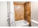 Bright bathroom with shower/tub combo and tile surround at 850 S River Dr # 1066, Tempe, AZ 85281