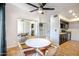 Dining area with round table, four chairs and mirrored closet at 850 S River Dr # 1066, Tempe, AZ 85281