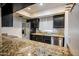 Kitchen with granite countertops and stainless steel appliances at 850 S River Dr # 1066, Tempe, AZ 85281