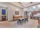 Elegant dining room with a live-edge table and modern chairs at 8912 W Roberta Ln, Peoria, AZ 85383