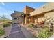 Front entrance with stone accents and desert landscaping at 8912 W Roberta Ln, Peoria, AZ 85383