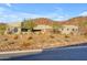 Modern desert home with mountain backdrop at 8912 W Roberta Ln, Peoria, AZ 85383