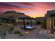 Landscaped backyard with a relaxing hot tub at 8912 W Roberta Ln, Peoria, AZ 85383