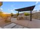 BBQ area with built-in grill and modern cabinetry at 8912 W Roberta Ln, Peoria, AZ 85383