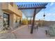 Relaxing patio with seating and pergola at 8912 W Roberta Ln, Peoria, AZ 85383