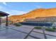 Private rectangular pool with tile accents and mountain views at 8912 W Roberta Ln, Peoria, AZ 85383