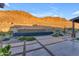 Private rectangular pool with tile accents and mountain views at 8912 W Roberta Ln, Peoria, AZ 85383